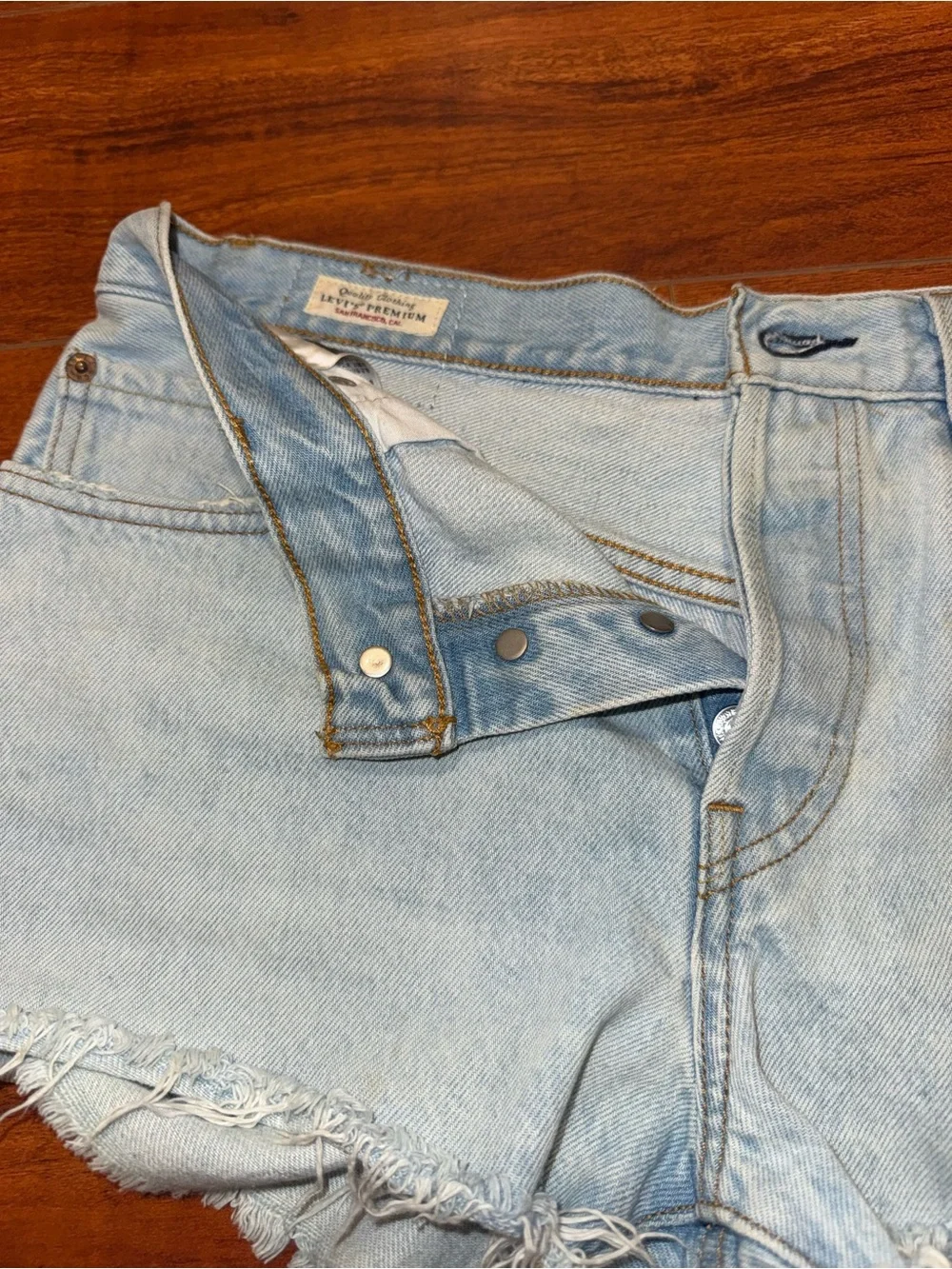 Levi's Light Blue Frayed Denim Cutoff Shorts
